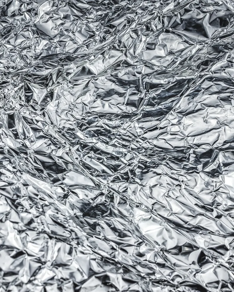 Comment choisir entre une porte battante et une porte coulissante en aluminium